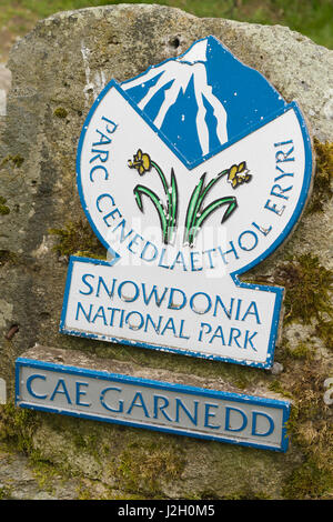 Snowdonia National Park or Parc Cenedlaethol Eryri in Welsh boundary sign. Stock Photo