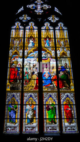 COLOGNE, GERMANY - SEPTEMBER 21: Stained glass church window with Pentecost theme in the cathedral on September 21, 2014 in Cologne Stock Photo
