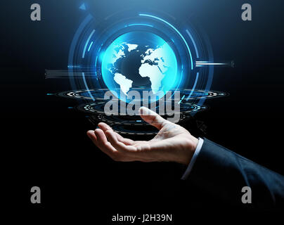 businessman hand virtual earth projection Stock Photo