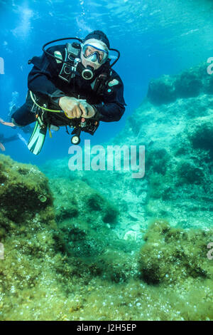 Diver on a Shallow Reef Stock Photo