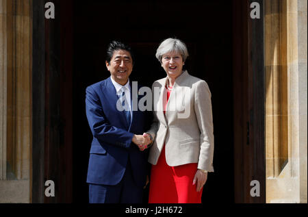 Prime Minister Theresa May welcomes Japan's Prime Minister Shinzo Abe ahead of talks at her country residence Chequers.