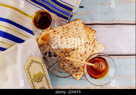 Jewish holiday hannukah low key image of jewish holiday Hanukkah with menorah traditional Candelabra and wooden dreidels spinning top . glitter overla Stock Photo