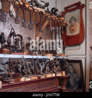 Collection of old keys and metal figurines Stock Photo