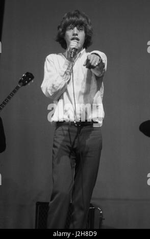 The Rolling Stones singer Mick Jagger during a concert at the Olympia in Paris, on October 20, 1964. Photo André Crudo Stock Photo