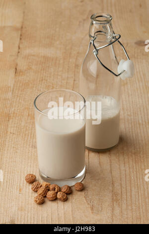 Glass Horchata milk and unshelled chufa nuts Stock Photo