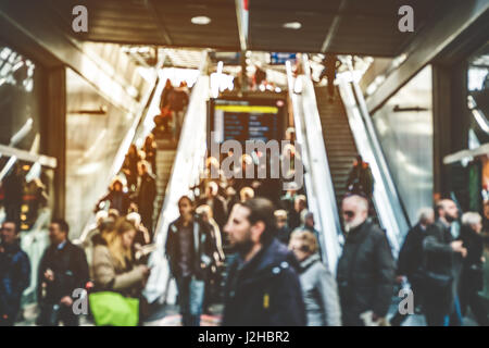 travel people on escalator - concept blur of peopls on stairs Stock Photo