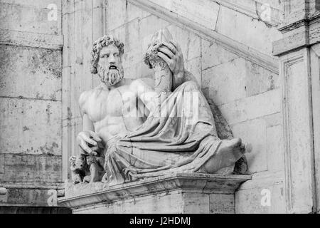 River Tiber god ancient monumental statue with Romulus and Remus twins from Capitoline Hill Square in Rome (Blakc and White) Stock Photo