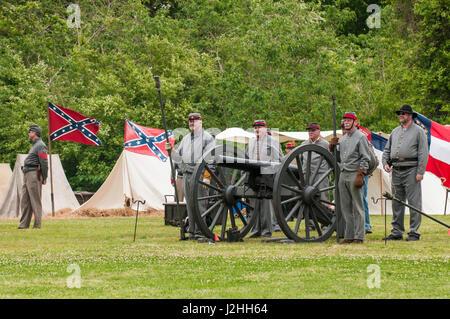 Confederate artillery unit cannon action during Thunder on the Roanoke Civil War reenactment in Plymouth, North Carolina, USA. Stock Photo