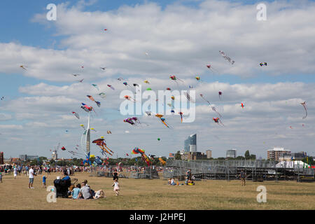 Colourful kites filling the sky at the annual kite festival on Southsea common in Portsmouth Hampshire. Stock Photo