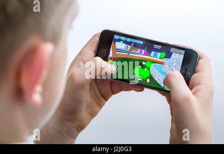 Boy Playing Mobile Game App On Device Virtual Reality Glasses On White Background Boy Action And Using In Virtual Headset Vr Box For Use With Smart Stock Photo Alamy - handsome roblox e boy