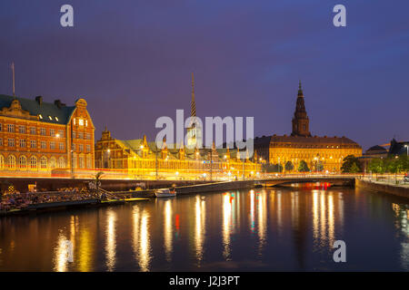 Night view on Christiansborg Palace and Stock Exchange building over the channel in Copenhagen. Night view on Christiansborg Palace and Stock Exchange building over the channel in Copenhagen.