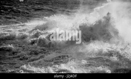 Black and white: Rough seas captured in Hondoq ir Rummien, Gozo during the stormy weekend of the 18th of December, 2016. Stock Photo