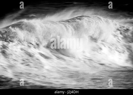 Black and white: Rough seas captured in Hondoq ir Rummien, Gozo during the stormy weekend of the 18th of December, 2016. Stock Photo