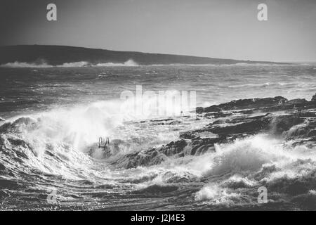 Black and white: Rough seas captured in Hondoq ir Rummien, Gozo during the stormy weekend of the 18th of December, 2016. Stock Photo