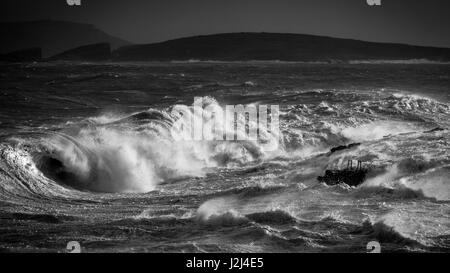 Black and white: Rough seas captured in Hondoq ir Rummien, Gozo during the stormy weekend of the 18th of December, 2016. Stock Photo