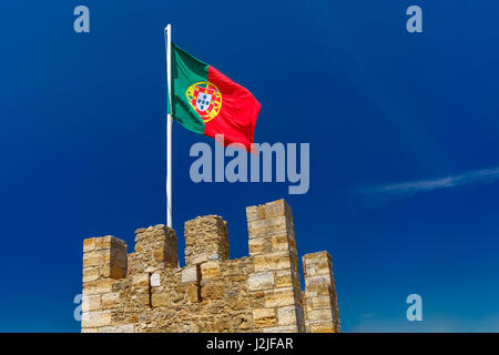 Portuguese flag on fortress wall, Lisbon, Portugal Stock Photo