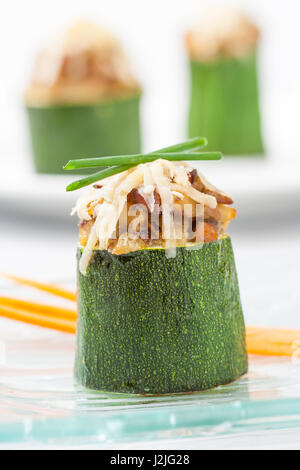 A stuufed zucchini appetizer with mushrooms. Stock Photo