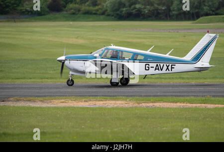 Piper PA-28-180 Cherokee takes off from North Weald airfield Stock Photo