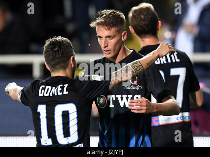 Bergamo. 29th Apr, 2017. Atalanta's Andrea Conti (C) celebrates scoring with Alejandro Gomez (L) during a Serie A soccer match between Juventus and Atalanta at 'Atleti Azzurri D'Italia' stadium in Bergamo, Italy, April. 28, 2017. The match ended with a 2-2 draw. Credit: Alberto Lingria/Xinhua/Alamy Live News Stock Photo