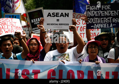 Manila, Philippines - Apr 12, 2017. People sitting on LRT train in ...