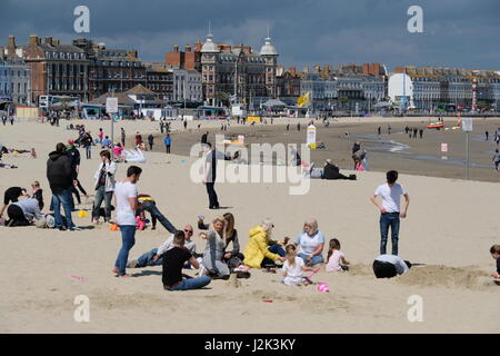 Weymouth, Dorset, UK. 29th Apr, 2017. Beach goers make the best or a sunny and breezy afternoon at Weymouth as the weather is set to deteriorate tomorrow with rain moving into the area. Credit: Tom Corban/Alamy Live News Stock Photo