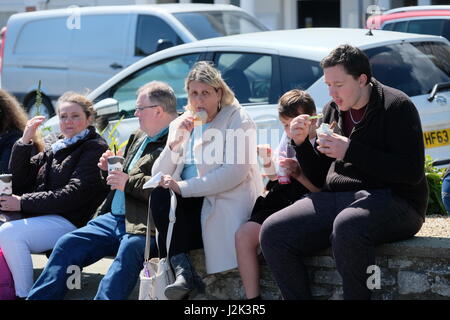 Weymouth, Dorset, UK. 29th Apr, 2017. Icecreams all round As visitors make the best or a cool and breezy day with occasional spells of sunshine at Weymouth as the weather is set to deteriorate tomorrow with rain moving into the area. Credit: Tom Corban/Alamy Live News Stock Photo