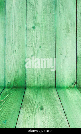 Natural weathered wooden planks background. Old painted in green boards panels Stock Photo