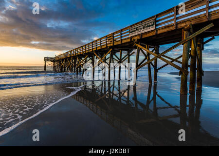 Isle of Palms Pier at sunrise in Charleston, South Carolina Stock Photo