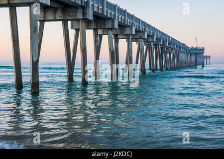 Sandy Panama City Beach Pier at Sunrise in Panama City, Florida Stock Photo