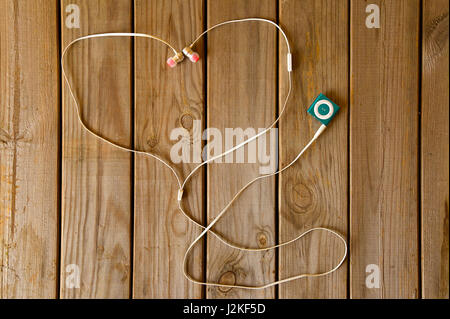 Music player on wooden desk Stock Photo