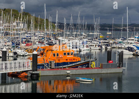 View across Brixham Harbour and Marina, with the RNLI Torbay lifeboat moored, in South Devon, UK Stock Photo