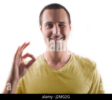 Man winking and making perfect sign Stock Photo