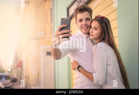Young couple taking a selfie Stock Photo