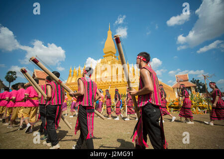 Traditional dress People at a ceremony at the Pha That Luang Festival in the city of vientiane in Laos in the southeastasia. Stock Photo