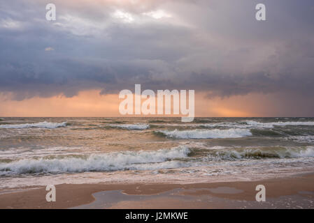 Landscape stormy sea at sunset Stock Photo