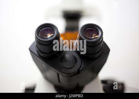 Modern microscope equipment in a microbiology research laboratory. New technology for scientists for better research and development in the labs. Stock Photo