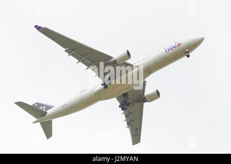 CHIANG MAI, THAILAND - 12 JULY 2016 - Thai Airways aircraft flies in for landing at Chiang Mai International Airport on 12 July, 2016 Stock Photo