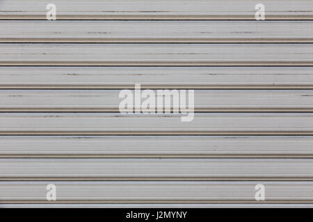 Roll metal shutter gate in gray color Stock Photo