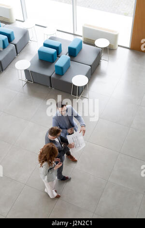 Professional business people working together as team on project Stock Photo