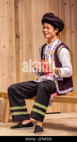 Zhaoxing, Guizhou, China.  Traditional Musical Performance by Member of Dong Ethnic Minority. Stock Photo