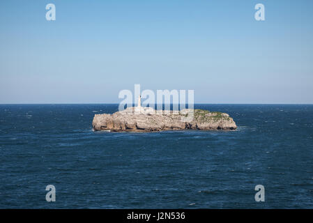 Mouro island lighthouse in Santander, Cantabria, Spain. Stock Photo