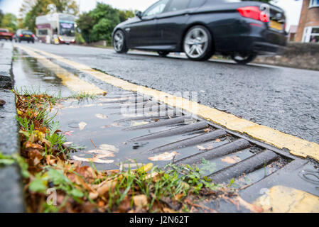 Blocked drain, Gutter, Road, Stock Photo