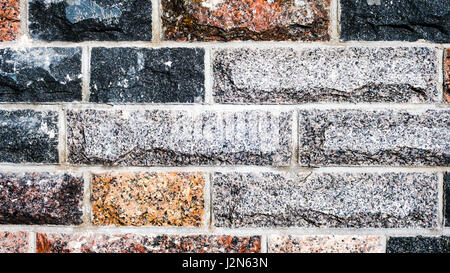 Seamless texture, background, stone lined with granite walls. sandstone. stone background wall. Facing Stone Stock Photo