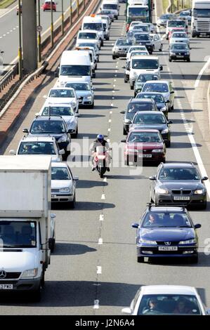 Traffic congestion on the City Bypass as seen from the bridge on the round-a-bout at the end of the Calder Ro Stock Photo