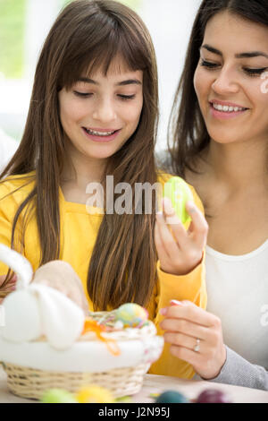 happy little girl with  mother and Easter egg Stock Photo