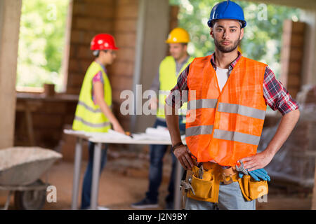 Portrait of construction worker at reconstruction area Stock Photo