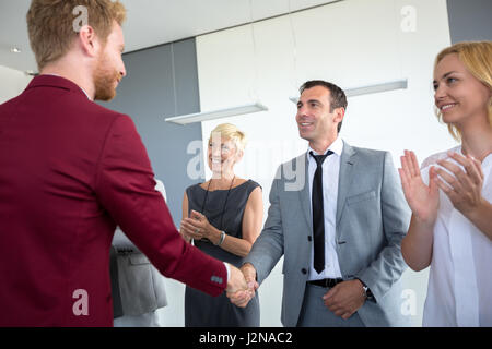 Business agreement and handshake of two managers Stock Photo