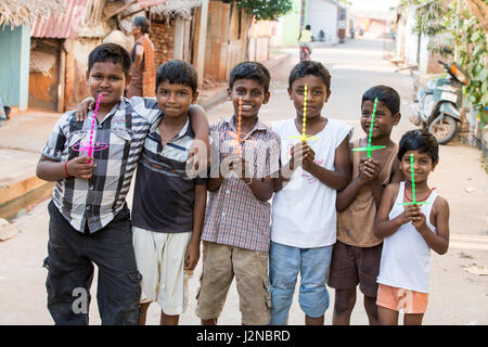 Illustrative image. Pondicherry, Tamil Nadu, India - Marsh 07, 2014. Poor child with smile feeling, in the street Stock Photo