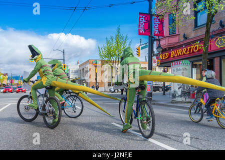 Dinosaurs against fossil fuels at  Earth Day Parade, Vancouver, British Columbia, Canada Stock Photo