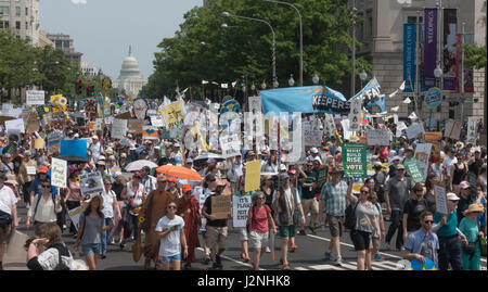 Washington, DC, USA. 29 April, 2017. Massive crowd demonstrating against Donald Trump's environmental protection rollbacks marched down Pennsylvania Avenue to the White House after rally near the U.S. Capitol.  Credit: Bob Korn/Alamy Live News Stock Photo